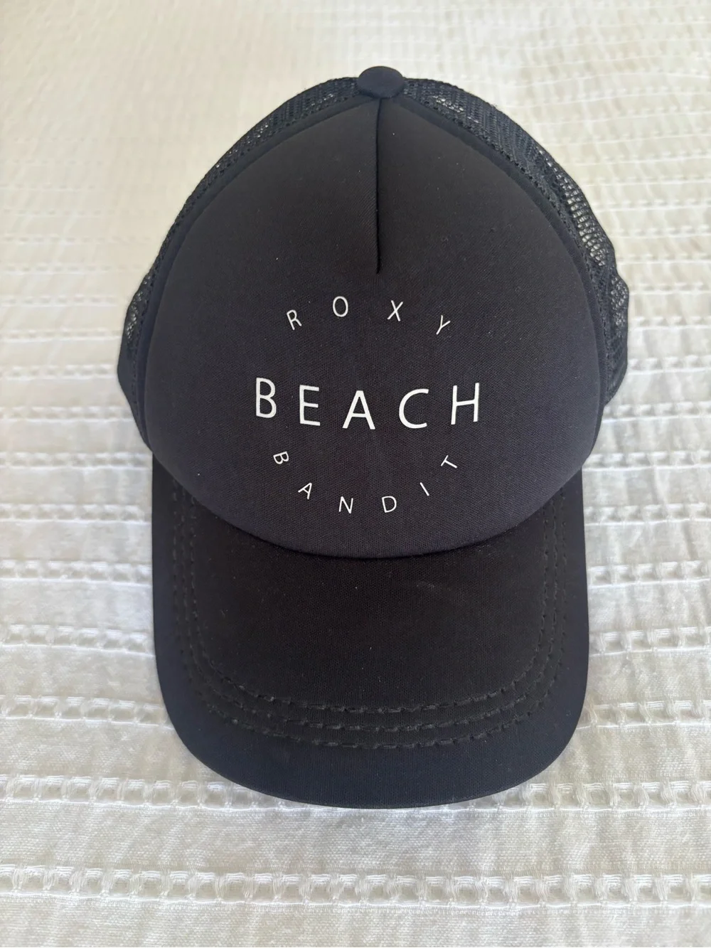 Roxy Beach Bandit Trucker Hat in Black with White Print